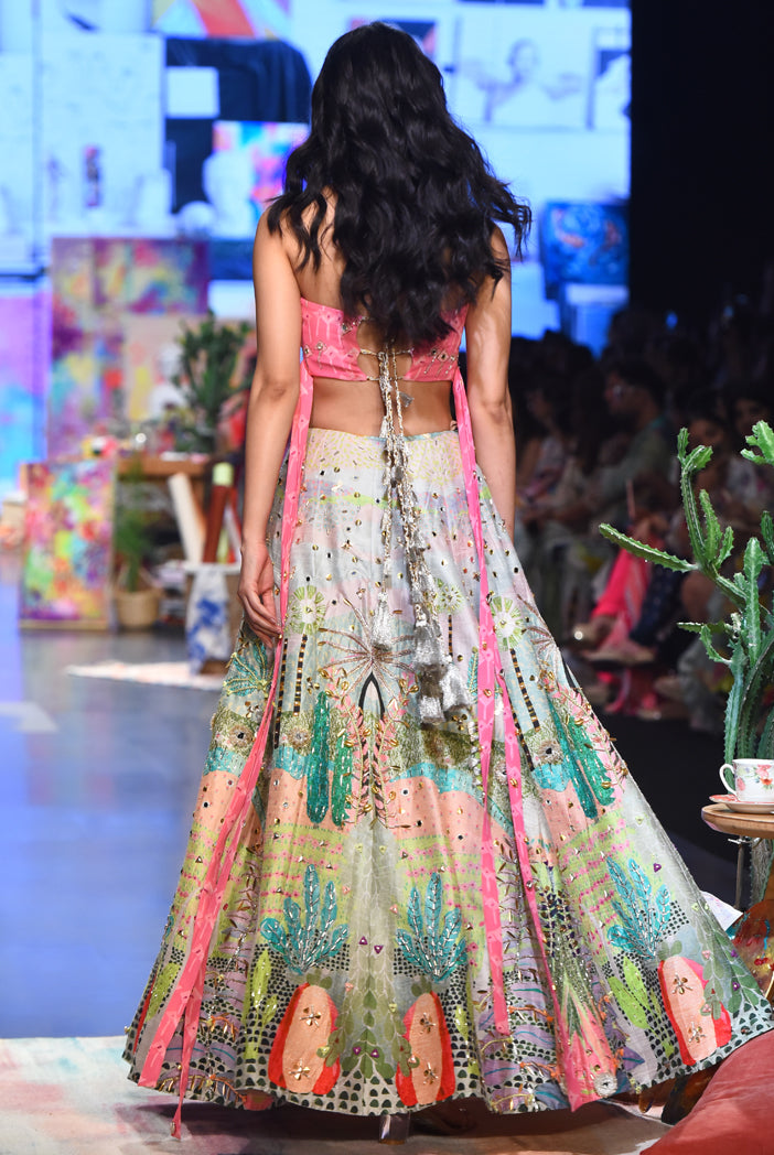 Pink Kite Georgette Printed Embroidered Bustier With Tropical Dupion Silk Printed Embroidered Lehenga And A Pink Mukaish Net Dupatta With Tassels