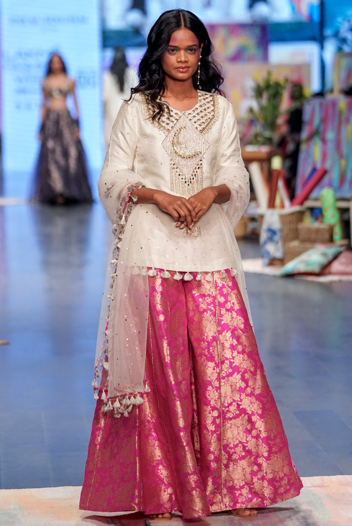 Off white abla silk embroidered kurta with hot pink brocade sharara and off white mukaish dupatta. - The Grand Trunk