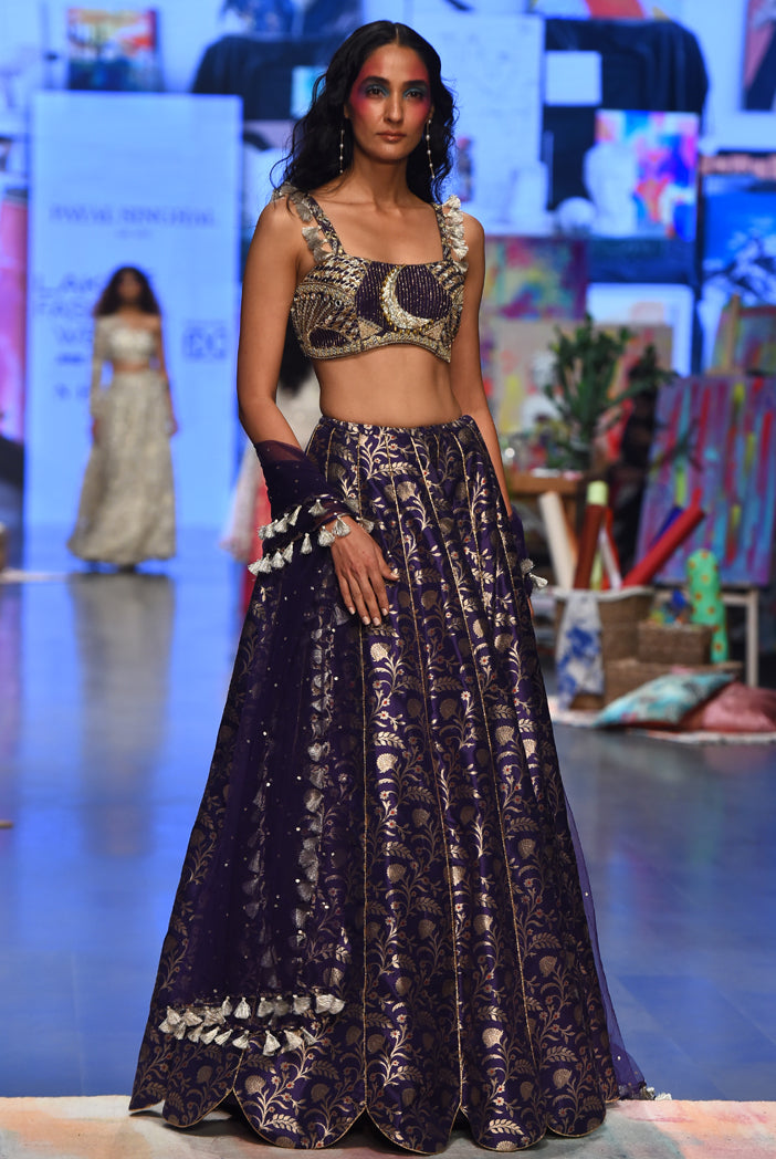 Navy dupion brocade silk embroidered bustier with brocade scalloped hem lehenga and mukaish net dupatta. - The Grand Trunk