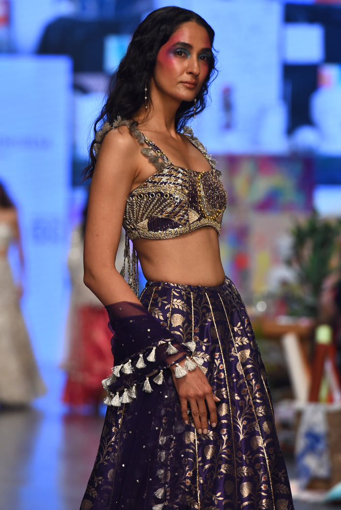 Navy dupion brocade silk embroidered bustier with brocade scalloped hem lehenga and mukaish net dupatta. - The Grand Trunk