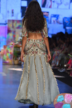 Load image into Gallery viewer, Powder blue velvet embroidered choli with a velvet basque organza skirt and mukaish net dupatta. - The Grand Trunk