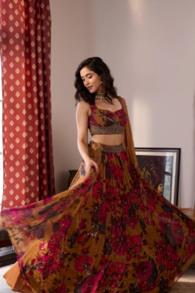 Astha Narang dark mustard chiffon floral lehenga set