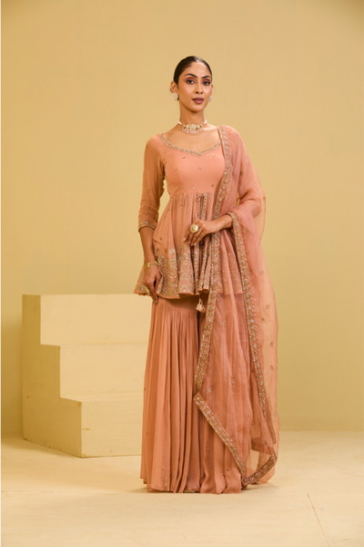 Esha Koul Peach front cut peplum set