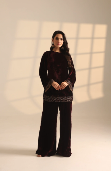 Astha Narang velvet kurta with palazzo set .