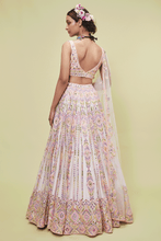 Load image into Gallery viewer, PEACH NET LEHENGA WITH RESHAM AND MIRROR - The Grand Trunk