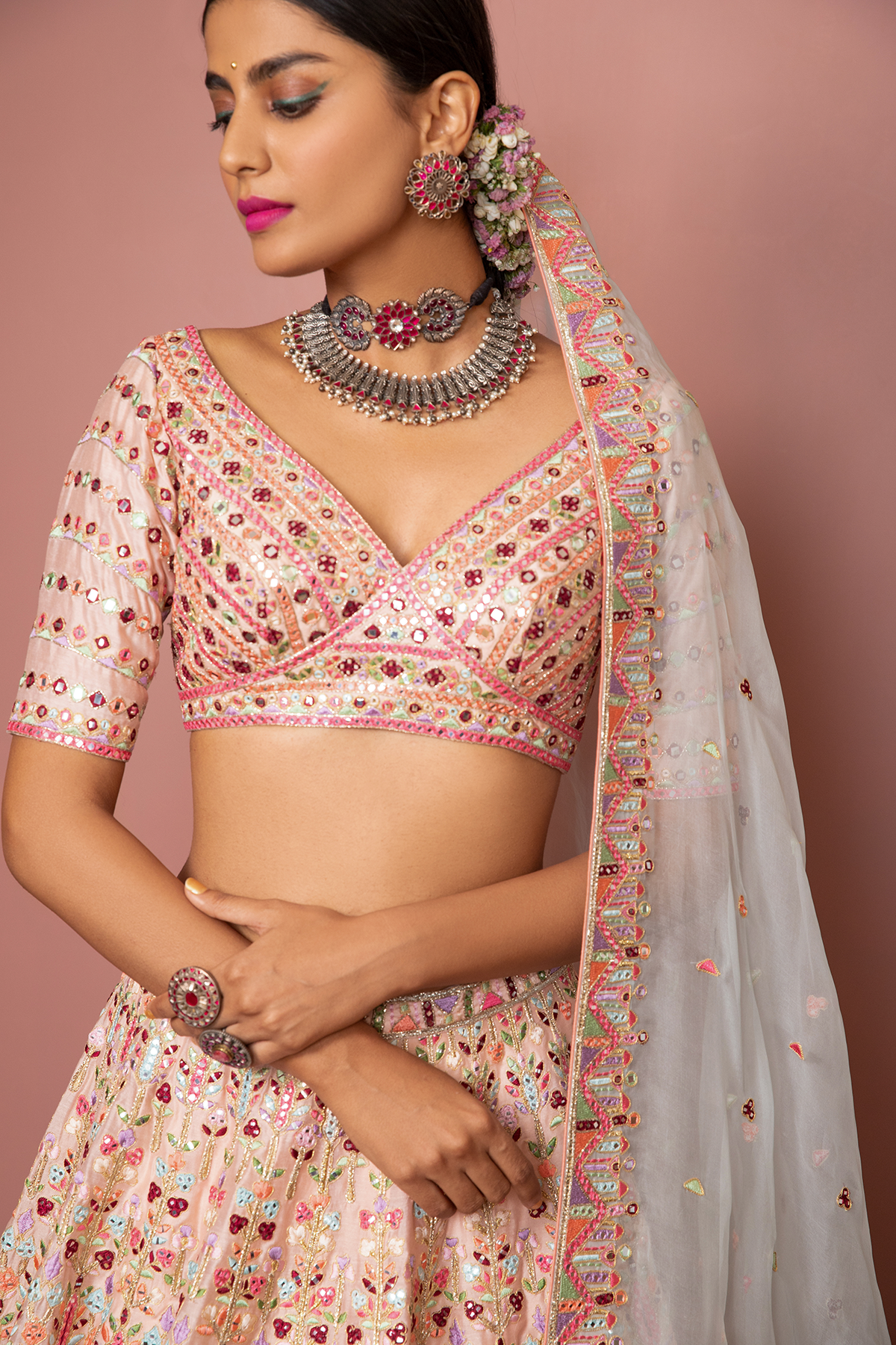 BLUSH PEACH HEAVILY EMBROIDERED LEHENGA SET WITH RESHAM MIRROR, - The Grand Trunk