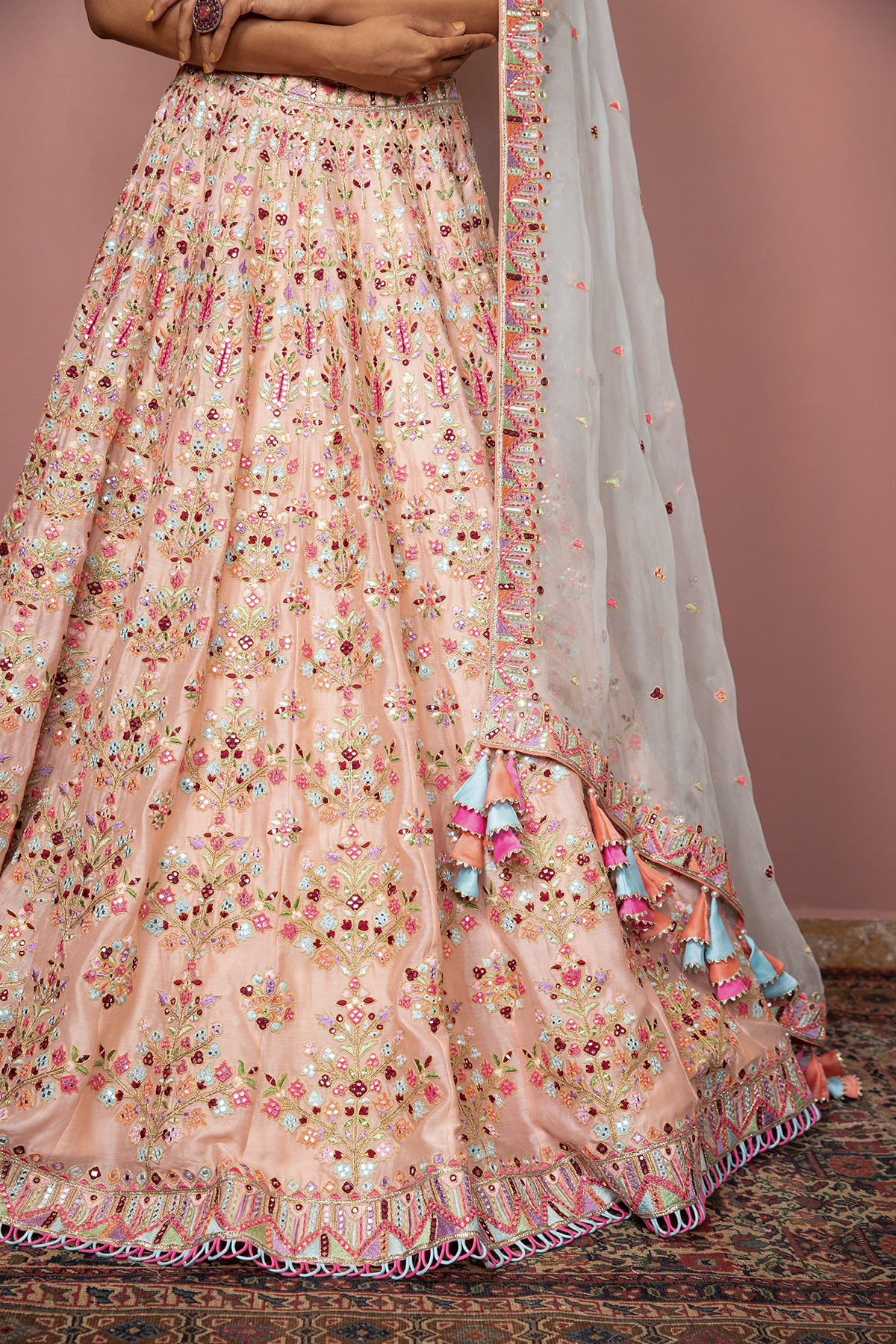 BLUSH PEACH HEAVILY EMBROIDERED LEHENGA SET WITH RESHAM MIRROR, - The Grand Trunk