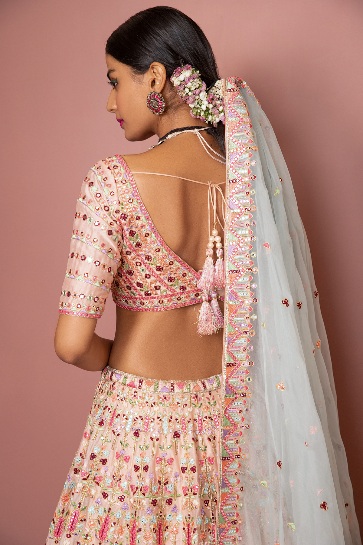 BLUSH PEACH HEAVILY EMBROIDERED LEHENGA SET WITH RESHAM MIRROR, - The Grand Trunk