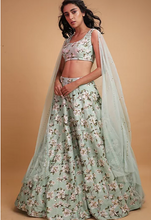 Load image into Gallery viewer, Astha Narang Green Printed Raw Silk Lehenga - The Grand Trunk