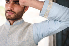 Load image into Gallery viewer, Powder blue rawsilk with self threadwork embroidery and pearl highlights - The Grand Trunk